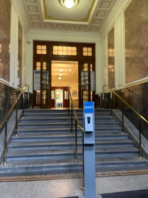 First set of stairs inside the entrance